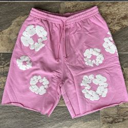 Pink denim tear shorts small