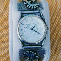 Antique signed sterling silver watch by the Navajo tribe, featuring the Kokopelli emblem.