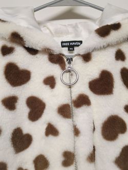 Woman size extra small Free Haven faux fur cow printed hearts.