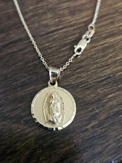 10k Gold Madre Guadalupe charm and 10k 18" in chain $295 obo
2.2 grams total
Acid Gold tested