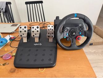 PlayStation Logitech steering wheel and pedals