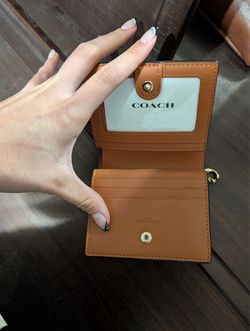 Coach wallet space dinosaur