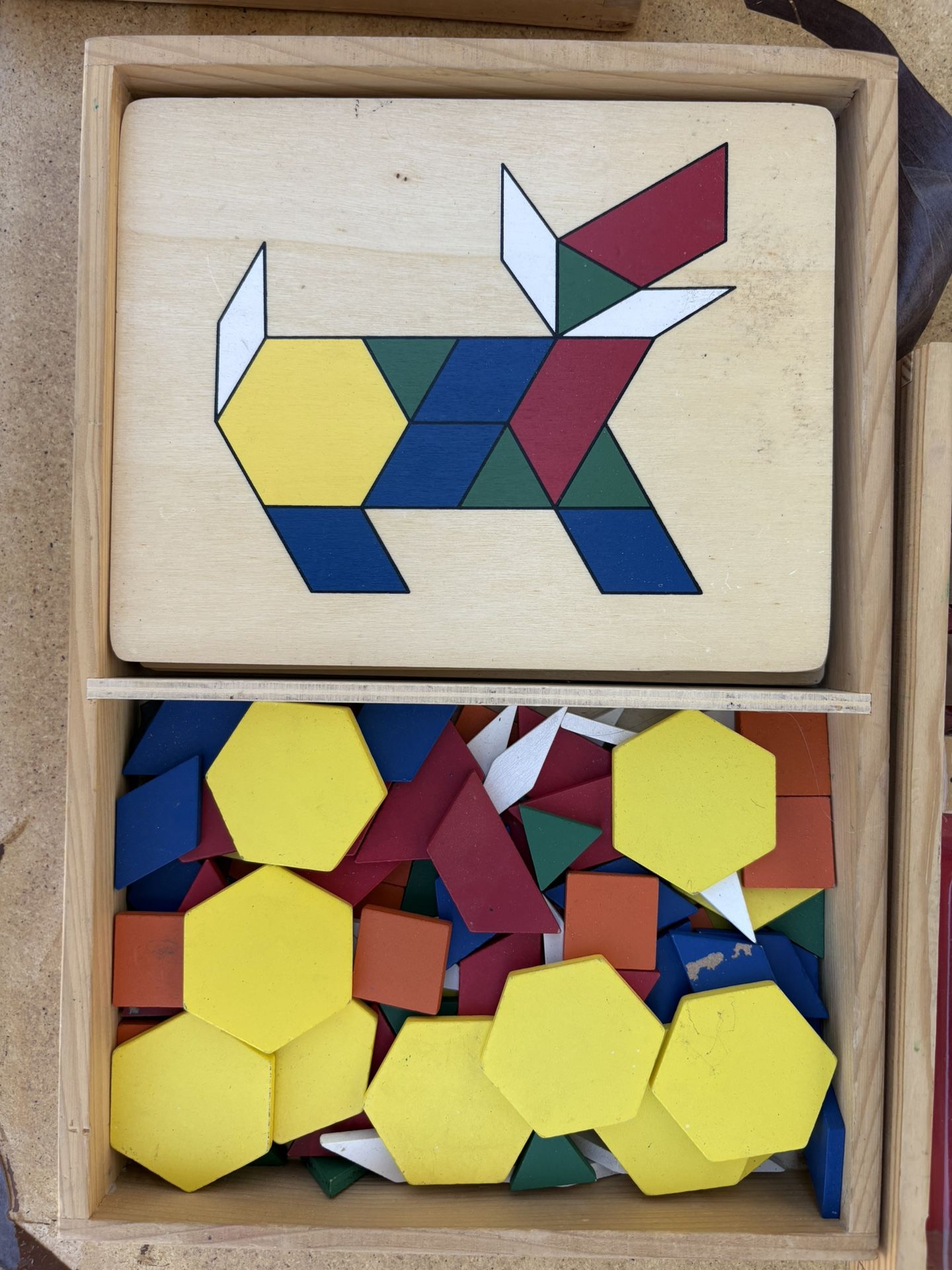 Wooden toys, wooden puzzles, learning games.