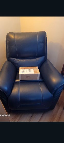 Leather electronic recliner, chair top of the line.