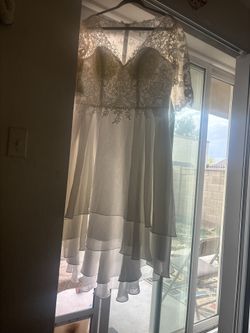 Wedding Dress Size 16 Wide AND I WILL NOT REPLY TO. IS IT AVAILABLE IF THE POST IS UP THEN IT IS AVAILABLE.!!