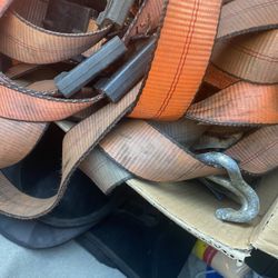 Straps and ratchets for wheels