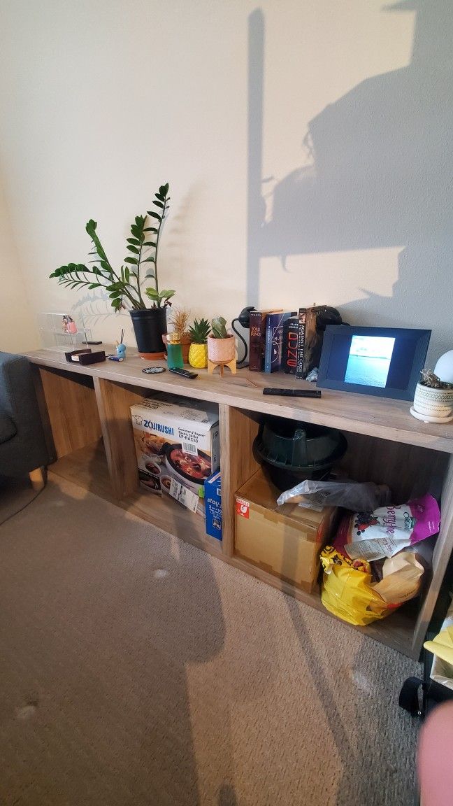 IKEA BESTA Console TableIKEA Besta Console Table
Total dimensions: 71"L x 25.5"H x 15.5"D
Each of the three cubbies are: 22"L x 23"H x 15"D