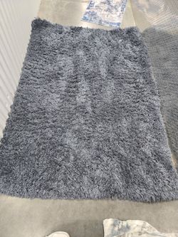 Assorted floor rugs