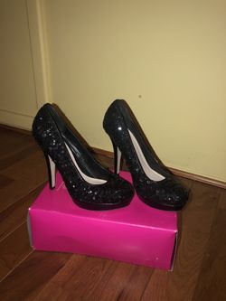 Black high heels in size 9.5