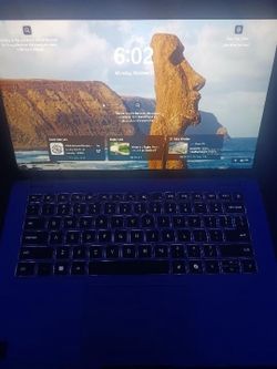 Blue Laptop with Backlit Keyboard