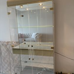 Curio gold display cabinet with glass doors