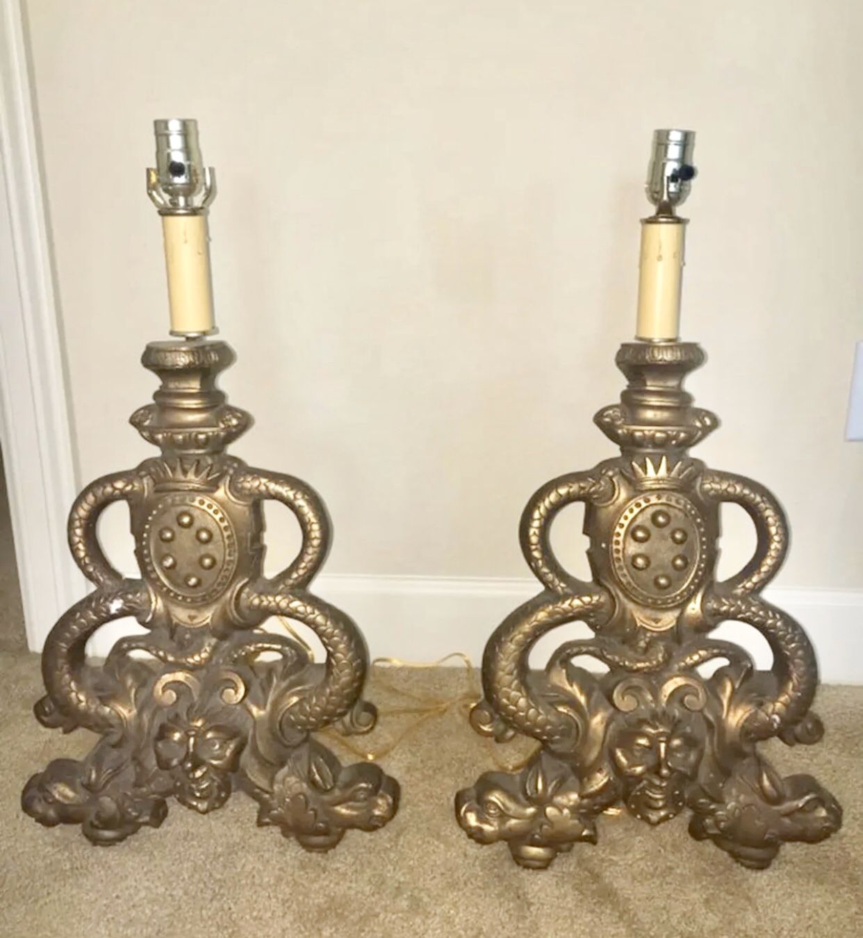 Solid bronze antique andirons converted to lamps