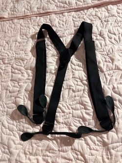 Black Y-back button-end suspenders featuring adjustable metal hardware and leather tabs