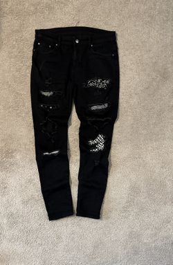 Amiri patchwork-distressed black Jean