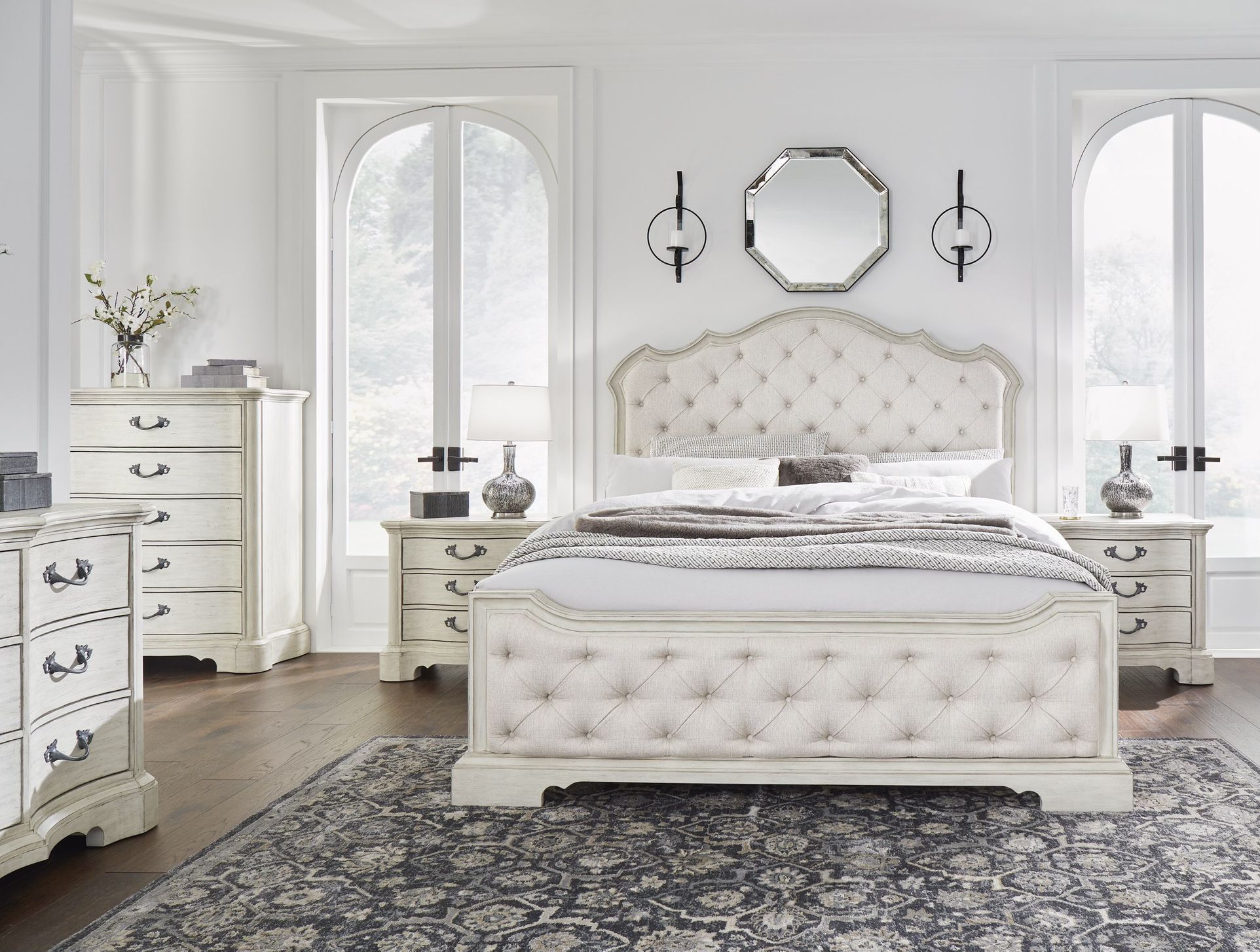 4pc Queen Upholstered Bed with Mirrored Dresser and Nightstand set by Ashley
