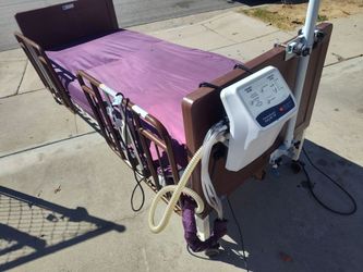 Invacare G5510 Hospital Bed with AirMattress, Trapeze, & Side Rails