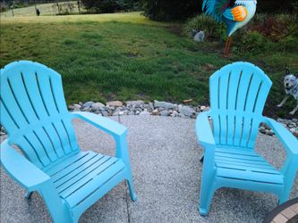 2 blue plastic chairs