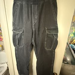 Black cargo pants with a relaxed fit