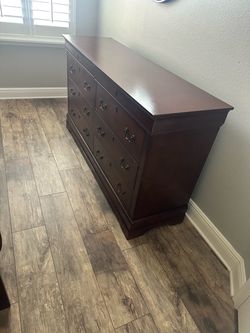 Dark Cherry Wood Dresser with Multiple Drawers