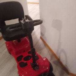 Brand new folding four wheel mobility scooter--rad (never used)