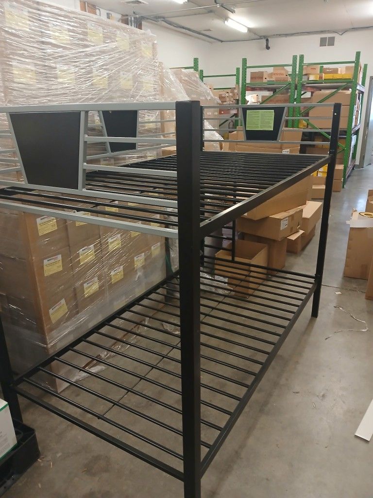 Two twin size bunk bed frames. 70$ a piece