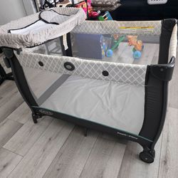 Graco® Pack n Play Dome LX Playard with Baby Bassinet Lightweight Portable Crib Push-Button Fold Travel Crib