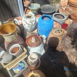 Small And Medium Clay Pots.   Small To Large Plastic Pots .  $1-5 .   Flowers.  Attention Big Pots  Gone