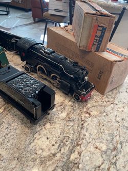 Lionel 1835e Engine and  Whistle Tender- Boxed  with Seven  Cars