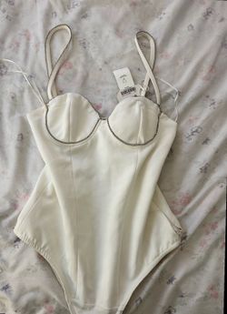 BRAND NEW WHITE BODYSUIT SIZE SMALL