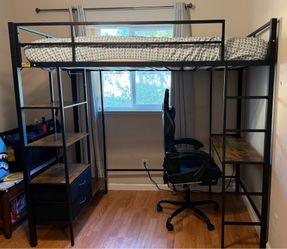 Twin bunk bed with desk