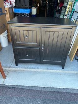 Black distressed cabinet