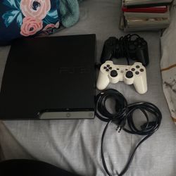 PS3 with 2 Remotes and 10 Games 