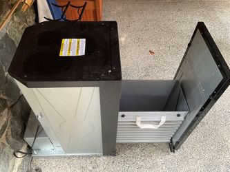 Fairly new under counter garbage compactor  15” .