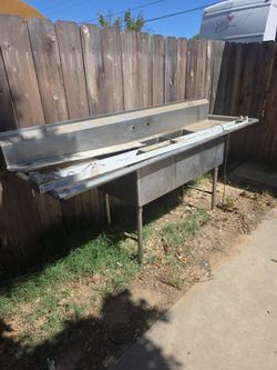 Three compartment commercial stainless steel sink