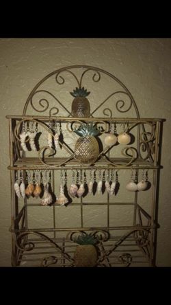 Handcrafted genuine shell, coral and shark teeth earrings, hair clips, necklaces and bracelets.