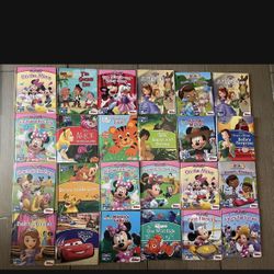 28 Books w/Minnie suitcase