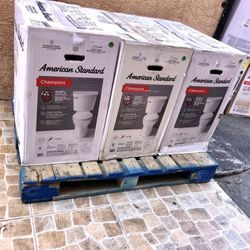 American Standard Champion Two-Piece 1.28 GPF Single Flush Elongated Chair Height Toilet with Slow-Close Seat in White