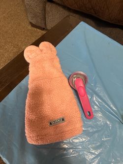 Small  dog jacket and shampoo brush