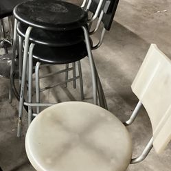 Plastic Black Stackable Chairs + White Chair 