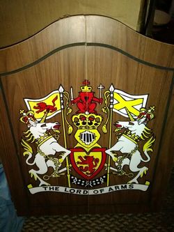 Dart board with cabinet score