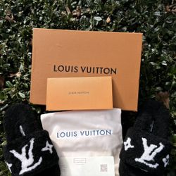 Louis Vuitton furry slides 