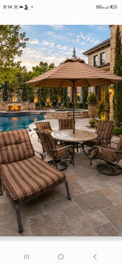 High End Cast Aluminum Patio Set- Swivel Rockers Chairs, Chaise Lounge, Stone Tile Table & Umbrella ( delivery optional)