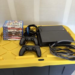 PS4 with 8 Games 2 Controllers And Headset 