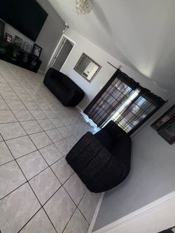 Black sofa and love seat