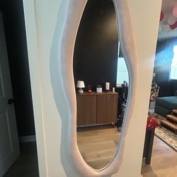 Wavy pink velvet mirror