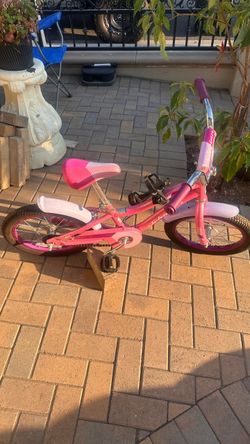 Kids Pink Bike with Purple Grips.  Schwinn Signature Girls' Lil Sunnyside 16" Bike