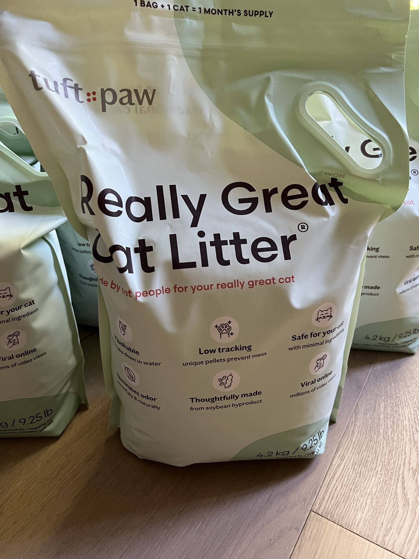8 Bags Of Tuft And Paw Cat Litter