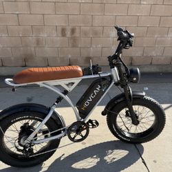 MOVCAN  V60 MOTOR Peak 1000W-30MPH-RANGE 70MILES : It is equipped with a 1000W brushless hub motor that can reach a top speed of 30 mph.  Battery & Ra