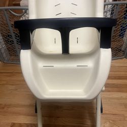 (FREE). High chair- Adjustable Height Capable