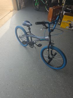 Boys Huffy , bicycle, blue and white good condition